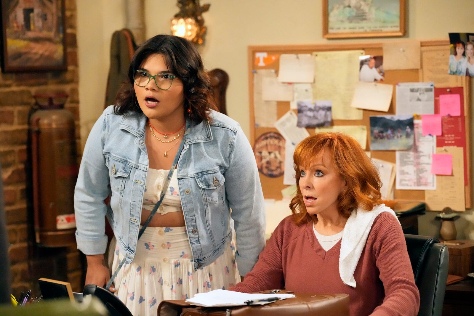 This image released by NBC shows Belissa Escobedo, left, and Reba McEntire in a scene from "Happy Place." (Casey Durkin/NBC via AP)