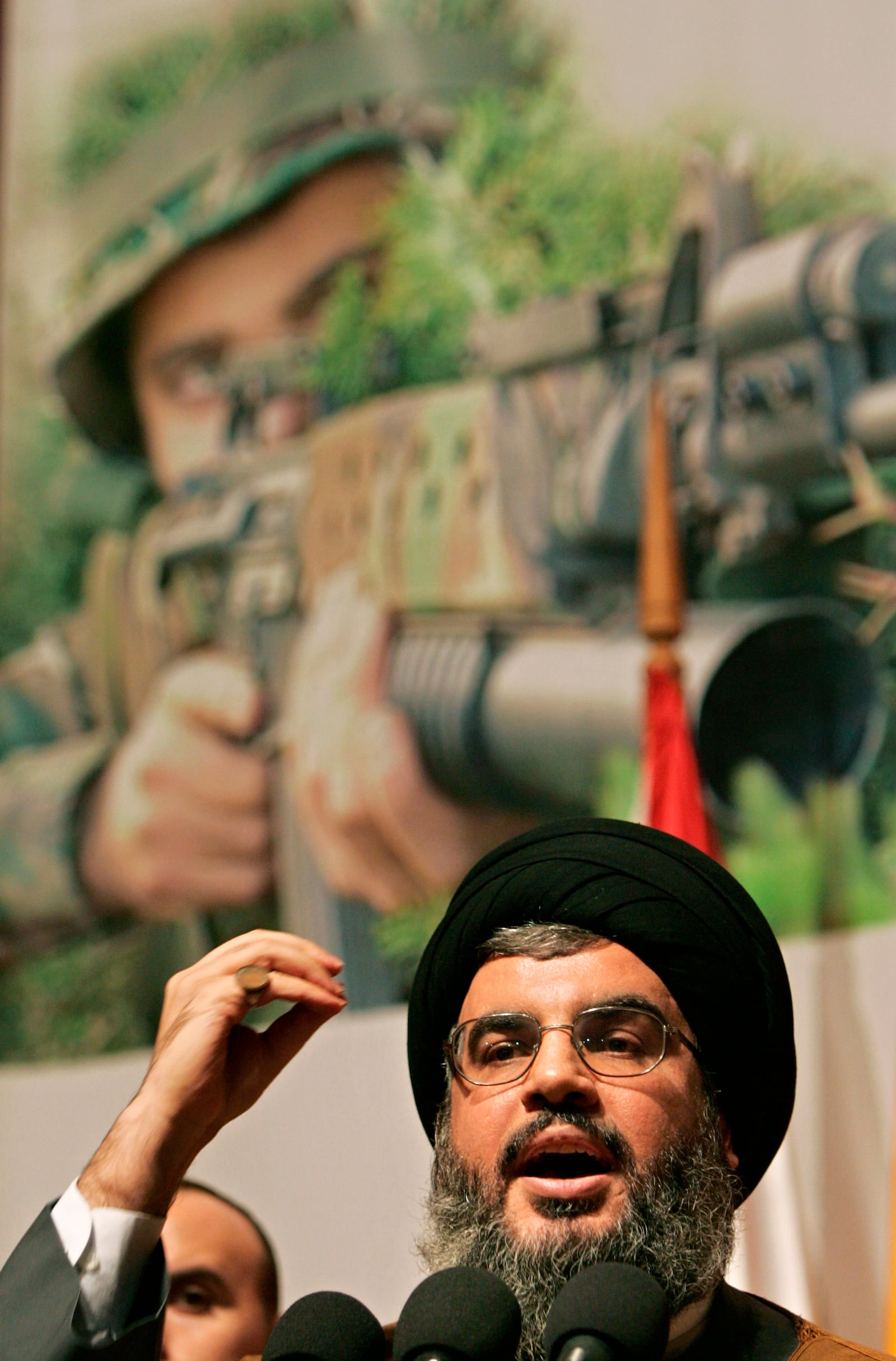 FILE - Hezbollah leader Hassan Nasrallah delivers a speech during the 14th commemoration of the death of his predecessor, Sheik Abbas Musawi, in Beirut, Thursday, Feb. 16, 2006. (AP Photo/Hussein Malla, File)