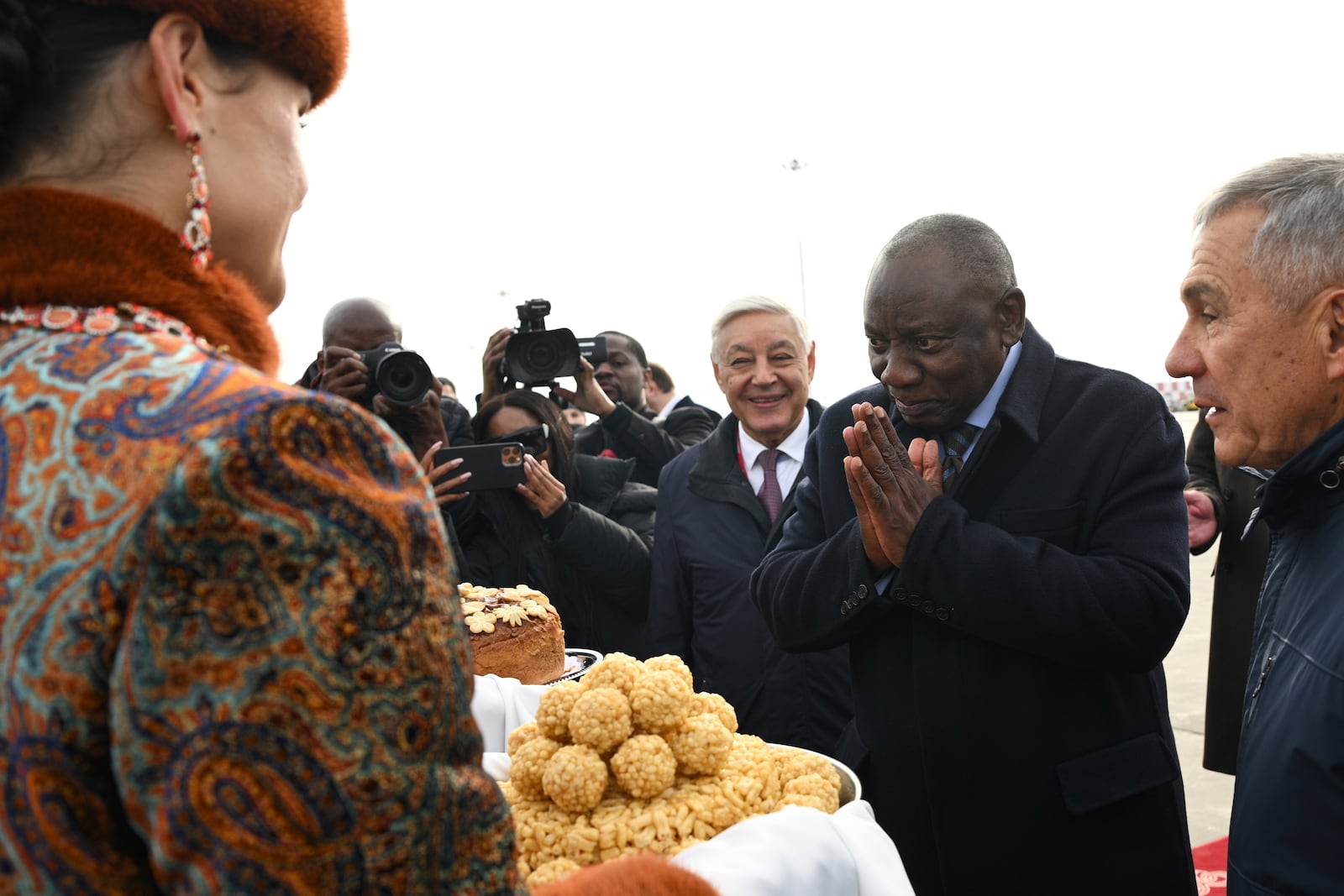 South African President Cyril Ramaphosa, 2nd right, arrives at Kazan International Airport prior to the BRICS summit in Kazan, Russia, Tuesday, Oct. 22, 2024. (Kirill Zykov/Photo host brics-russia2024.ru via AP)