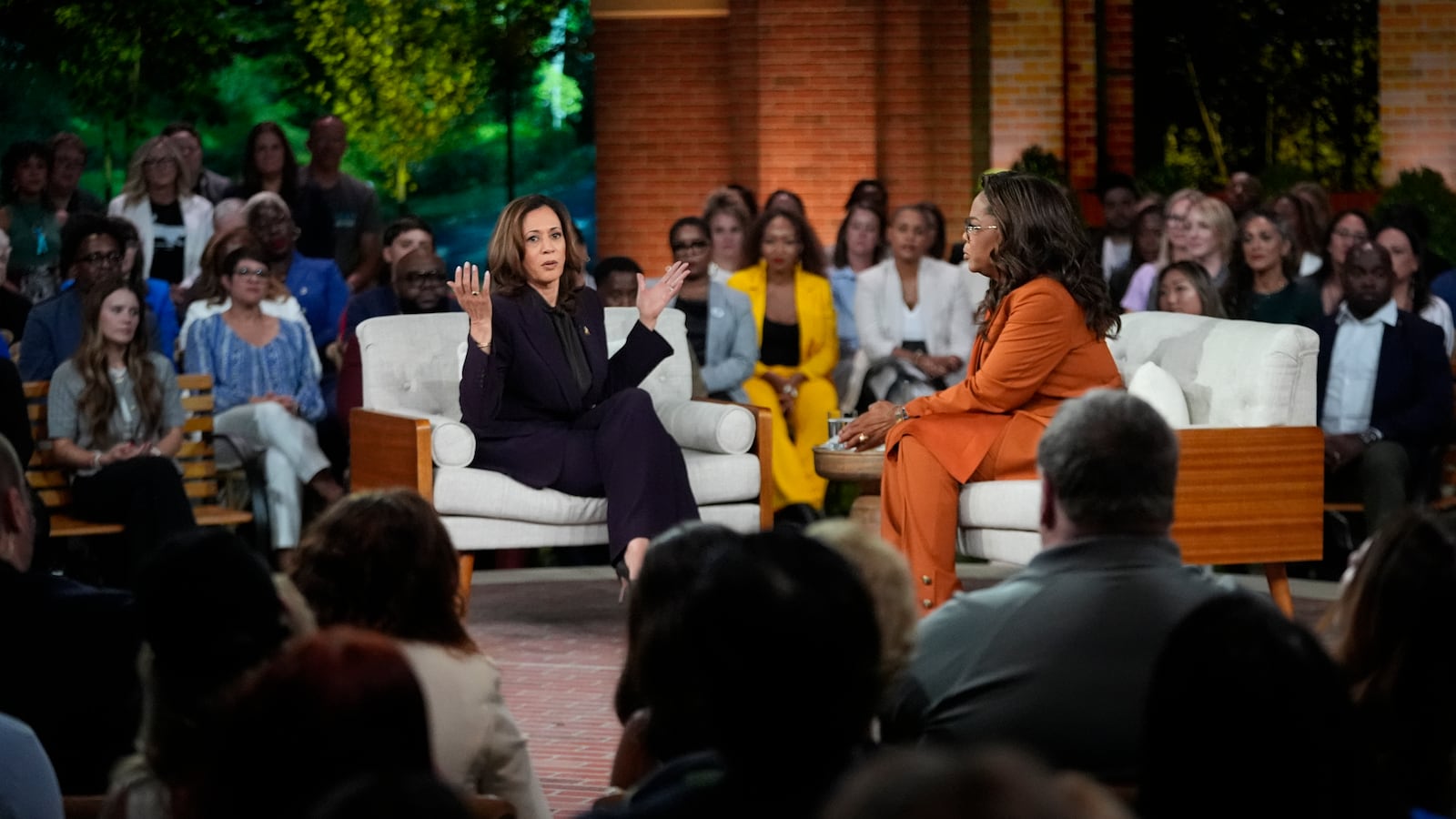 Democratic presidential nominee Vice President Kamala Harris joins Oprah Winfrey at Oprah's Unite for America Live Streaming event Thursday, Sept. 19, 2024 in Farmington Hills, Mich. (AP Photo/Paul Sancya)