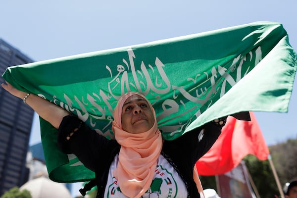 A demonstrator shows solidarity with the Palestinian people as leaders meet at the G20 summit in Rio de Janeiro, Monday, Nov. 18, 2024. (AP Photo/Bruna Prado)