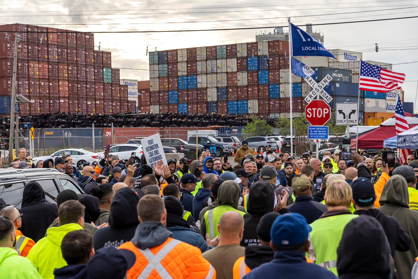 Workers take part in a port strike at Port Newark, Tuesday, Oct. 1, 2024, in Bayonne, N.J. (AP Photo/Eduardo Munoz Alvarez)