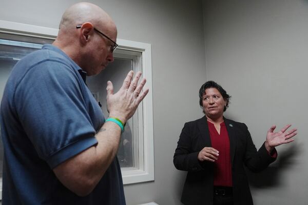 Border Patrol specialist Mitchell Holmes listens to instructor and chaplain Myrna Gonzalez during a training session, Wednesday, Nov. 20, 2024, in Dania Beach, Fla. (AP Photo/Marta Lavandier)