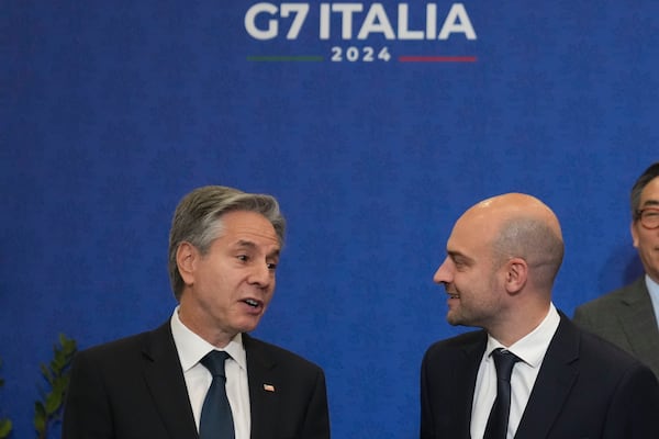 U.S. Secretary of State Antony Blinken, left, and foreign Ministers of France, Jean-Noël Barrot, wait for the family photo at the G7 of foreign Ministers in Fiuggi, some 70 kilometers south-east of Rome, Tuesday, Nov. 26, 2024. (AP Photo/Alessandra Tarantino, Pool)