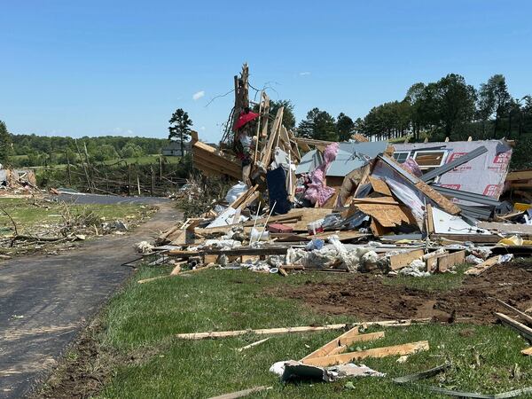 A destroyed home lays in a pile following severe weather in London, Kentucky, Saturday, May 17, 2025. (AP Photo/Dylan Lovan)