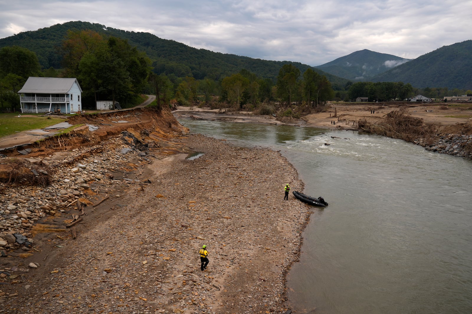 Personnel from Urban Search and Rescue Utah Task Force 1 search for victims of the Impact Plastics tragedy in the aftermath of Hurricane Helene Friday, Oct. 4, 2024, in Erwin, Tenn. (AP Photo/Jeff Roberson)