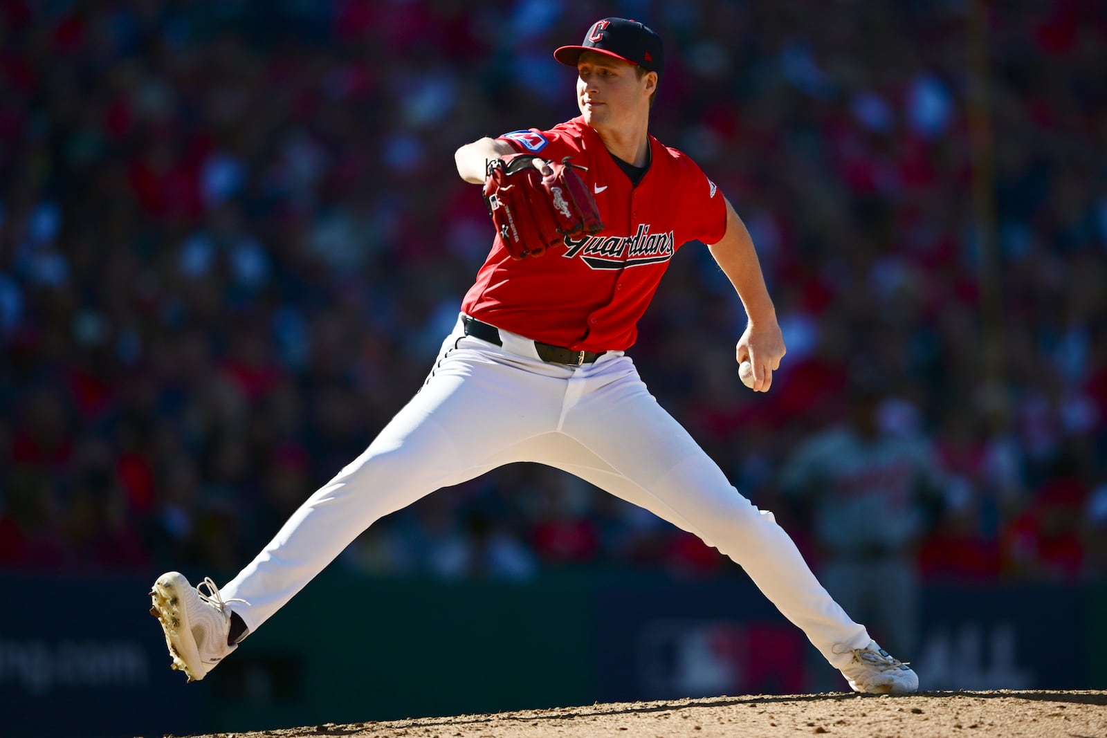 Cleveland Guardians' Tim Herrin pitches in the seventh inning during Game 1 of baseball's AL Division Series against the Detroit Tigers, Saturday, Oct. 5, 2024, in Cleveland. (AP Photo/David Dermer)