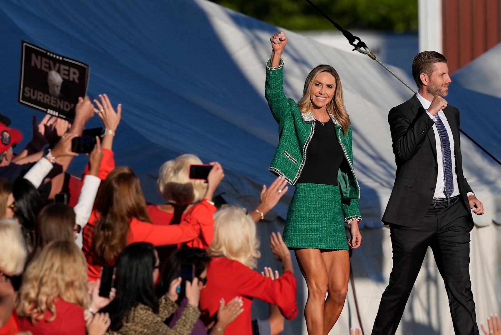 Eric Trump and Republican National Committee co-chair Lara Trump arrive at a campaign rally for Republican presidential nominee former President Donald Trump at the Butler Farm Show, Saturday, Oct. 5, 2024, in Butler, Pa. (AP Photo/Julia Demaree Nikhinson)