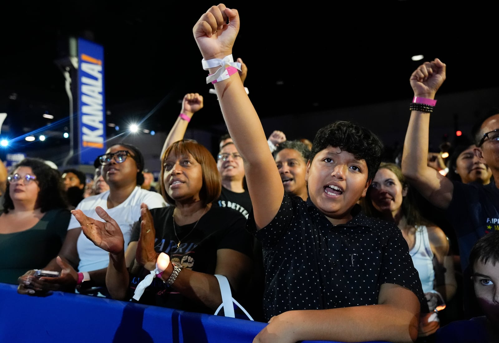 Attendees cheer as Democratic presidential nominee Vice President Kamala Harris speaks at a rally on Sunday, Sept. 29, 2024, in Las Vegas. (AP Photo/Carolyn Kaster)