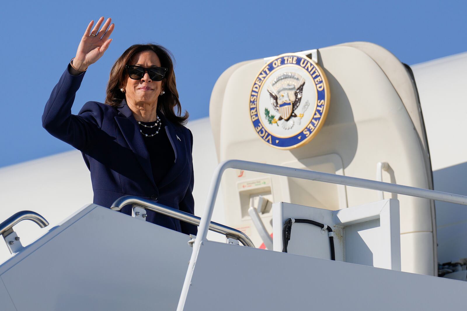 Democratic presidential nominee Vice President Kamala Harris boards Air Force Two in Las Vegas, Monday, Sept. 30, 2024, en route to Washington. (AP Photo/Carolyn Kaster)