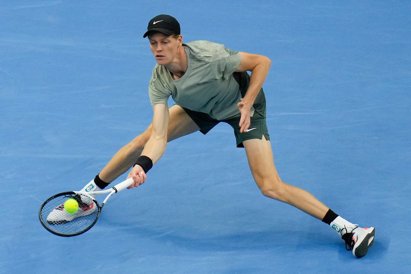 Jannik Sinner of Italy returns a shot from Carlos Alcaraz of Spain during their men's singles finals match of the China Open tennis tournament, at the National Tennis Center in Beijing, Wednesday, Oct. 2, 2024. (AP Photo/Andy Wong)