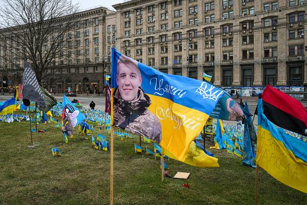 Flags wave at the memorial site for those killed during the war, in Independence Square in Kyiv, Ukraine, Saturday, Feb. 24, 2024. (AP Photo/Efrem Lukatsky)