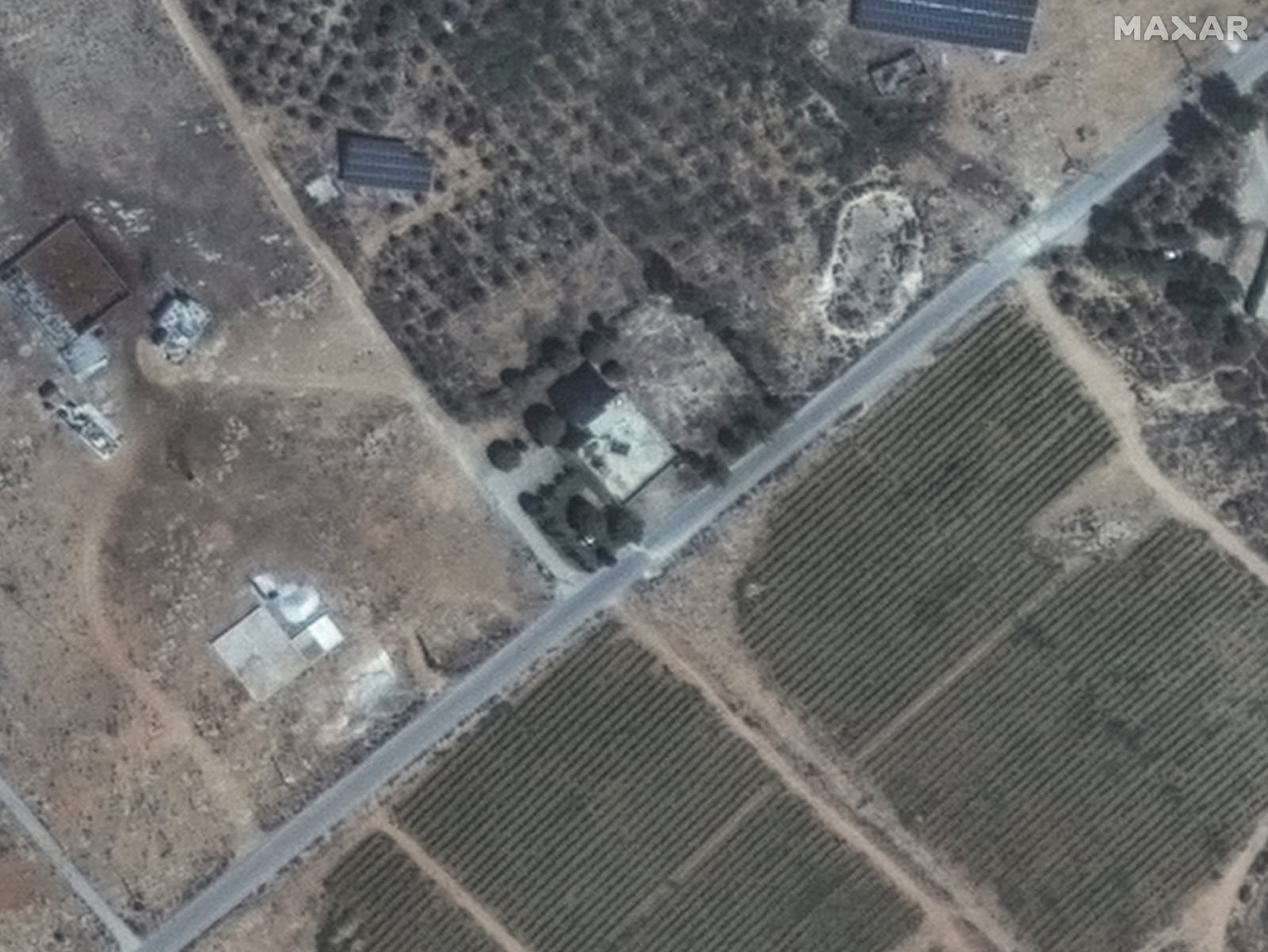 This satellite image released by Maxar Technologies shows a closer view of a building in Chouaghir, Lebanon, on Sept. 3, 2024, before airstrikes. (Satellite image ©2024 Maxar Technologies via AP)