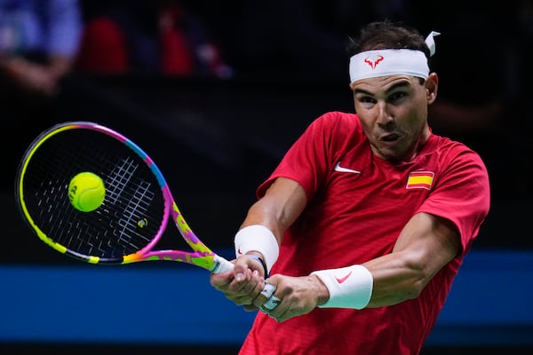 Spain's tennis player Rafael Nadal competes against Netherlands' Botic Van De Zandschulp during a Davis Cup quarterfinal match at Martin Carpena Sports Hall in Malaga, southern Spain, on Tuesday, Nov. 19, 2024. (AP Photo/Manu Fernandez)