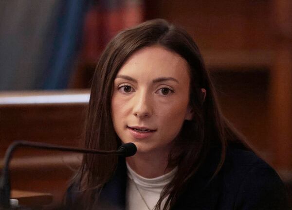 Katie McLaughlin, a paramedic/firefighter with the Canton Fire Department, tells the jury Monday, May 5, 2025, in Dedham, Mass., that Karen Read repeated to her "I hit him. I hit him," on the night in question. (Pat Greenhouse/The Boston Globe via AP, Pool)