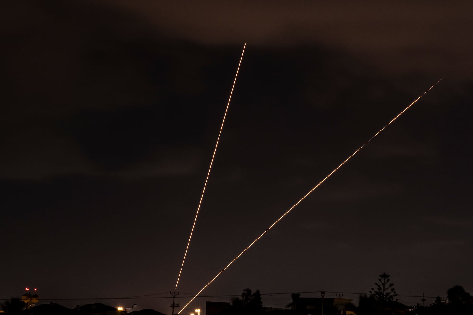 Israeli air defense system fires to intercept rockets over Hadera, Israel, Tuesday, Oct. 1, 2024. (AP Photo/Ariel Schalit)