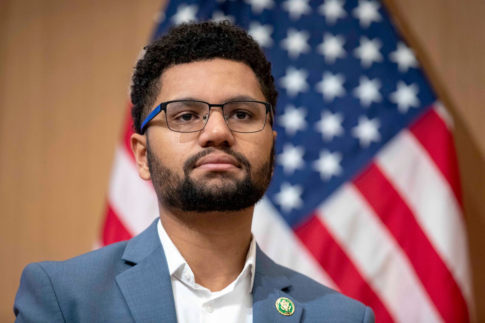 FILE - Rep. Maxwell Frost, D-Fla., listens during a panel discussion in Washington, Jan. 10, 2023. (AP Photo/Amanda Andrade-Rhoades, File)