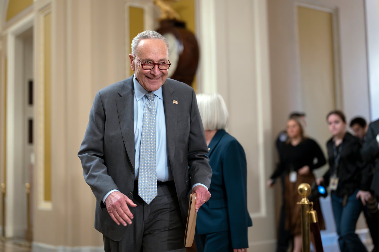 Senate Majority Leader Chuck Schumer, D-N.Y., arrives to speak to reporters after a lunch meeting, at the Capitol in Washington, Tuesday, Sept. 24, 2024. (AP Photo/J. Scott Applewhite)