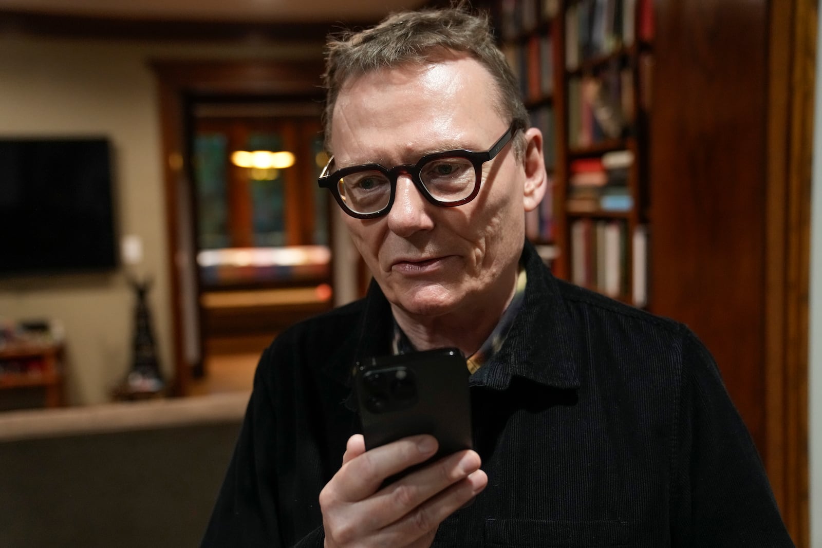 Nobel prize winner in Economics, James A. Robinson, gives an interview to the Associated Press from his home in the Hyde Park neighborhood of Chicago, Monday, Oct. 14, 2024. (AP Photo/Charles Rex Arbogast)