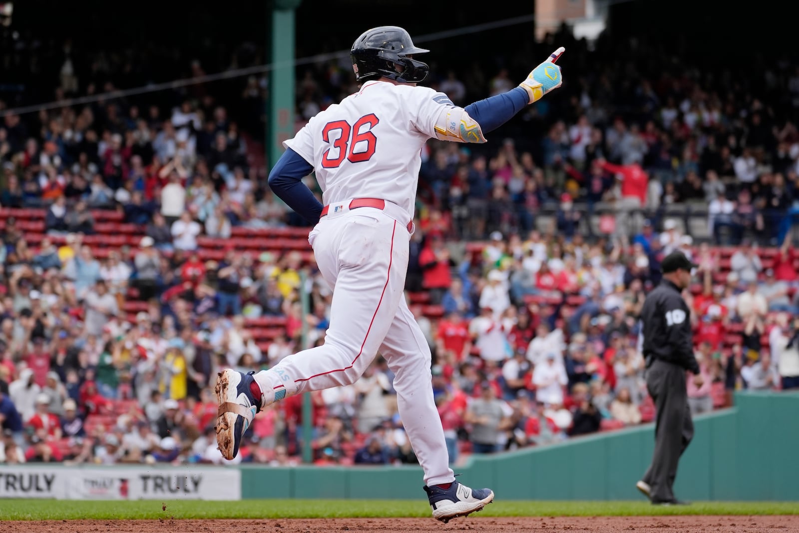 Boston Red Sox's Triston Casas (36) rounds the bases on his three-run home run during the first inning of the first game of a baseball doubleheader against the Minnesota Twins, Sunday, Sept. 22, 2024, in Boston. (AP Photo/Michael Dwyer)