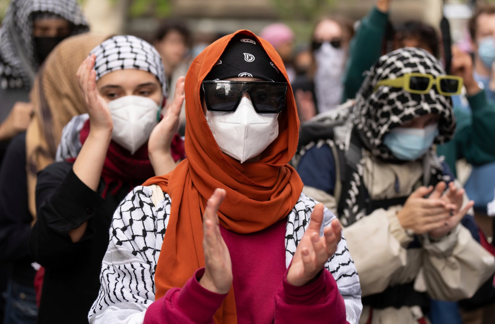 Attendees march during a pro-Palestinian demonstration on the anniversary of a Hamas attack on Israel that triggered the ongoing war in Gaza, in Montreal, Canada, Monday, Oct. 7, 2024. (Christinne Muschi/The Canadian Press via AP)