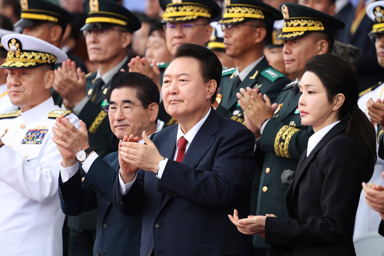 South Korean President Yoon Suk Yeol, center right, and his wife Kim Keon Hee attend a celebration to mark the 76th anniversary of Korea Armed Forces Day in Seongnam, South Korea Tuesday, Oct. 1, 2024. (Kim Hong-Ji/Pool Photo via AP)