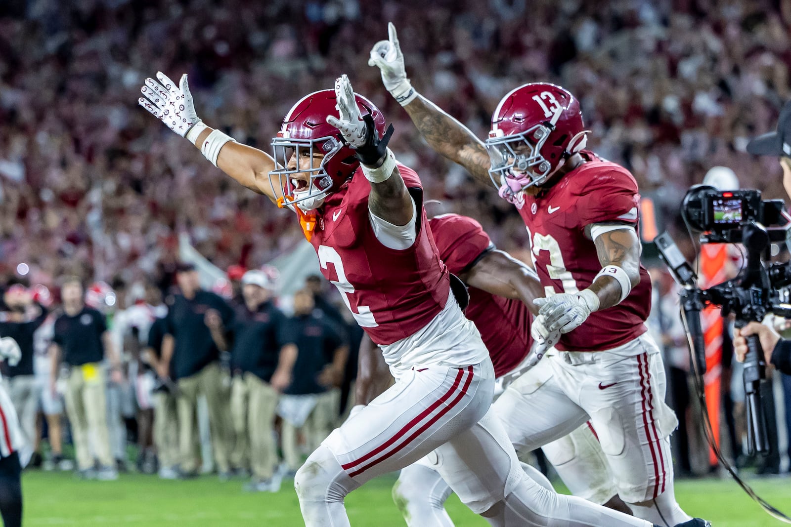 Alabama defensive back Zabien Brown (2) celebrates his game-clinching interception with Alabama defensive back Malachi Moore (13) during the second half of an NCAA college football game against Georgia, Saturday, Sept. 28, 2024, in Tuscaloosa, Ala. (AP Photo/Vasha Hunt)