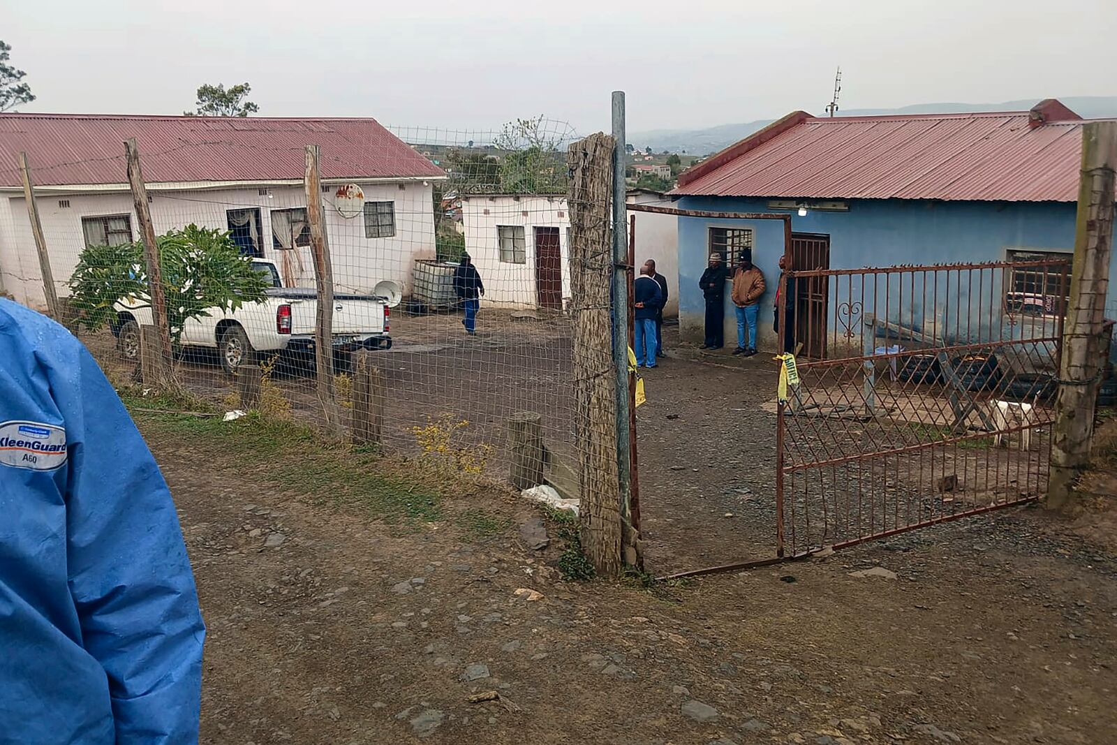 This photo supplied by the South Africa Police Services (SAPS) shows the scene where seventeen people were killed in two mass shootings that took place in close proximity to each other Friday night in Lusikisiki, South Africa, police said Saturday, Sept. 28, 2024. (South African Police Services via AP)