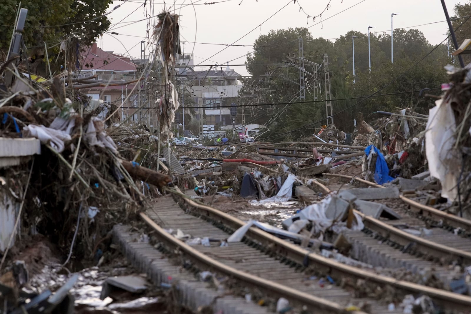 Train tracks are seen affected by floods in Paiporta, near Valencia, Spain, Wednesday, Oct. 30, 2024. (AP Photo/Alberto Saiz)