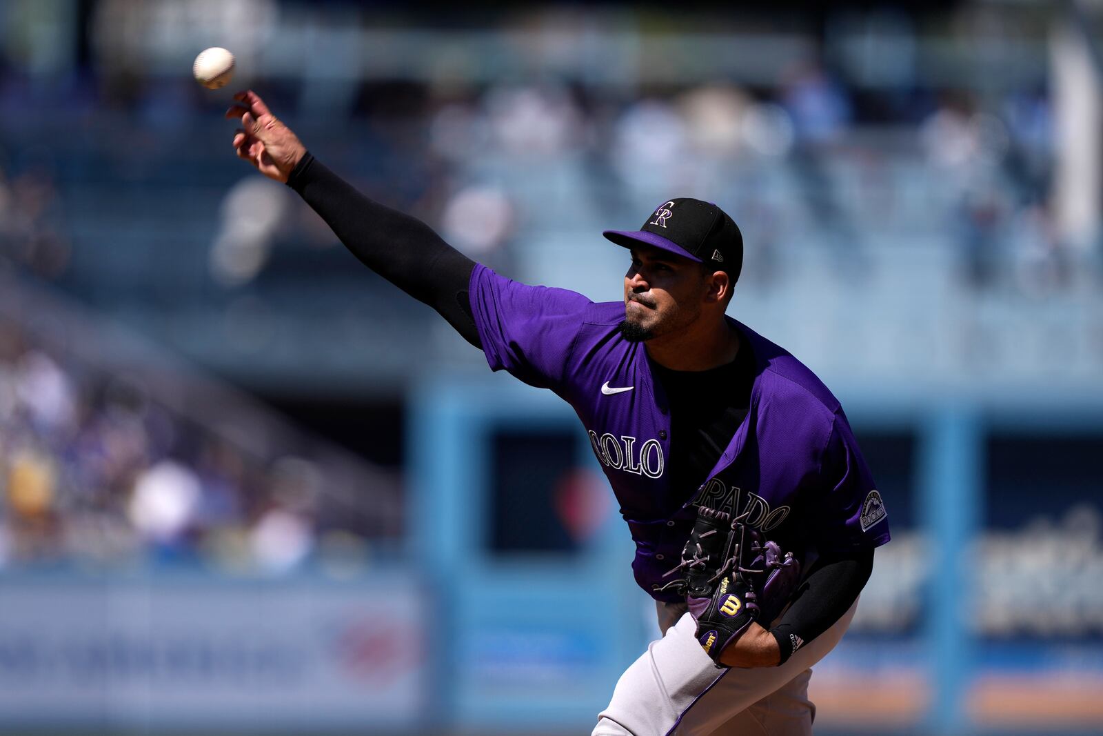 Colorado Rockies starting pitcher Antonio Senzatela throws to the plate during the second inning of a baseball game against the Los Angeles Dodgers, Sunday, Sept. 22, 2024, in Los Angeles. (AP Photo/Mark J. Terrill)