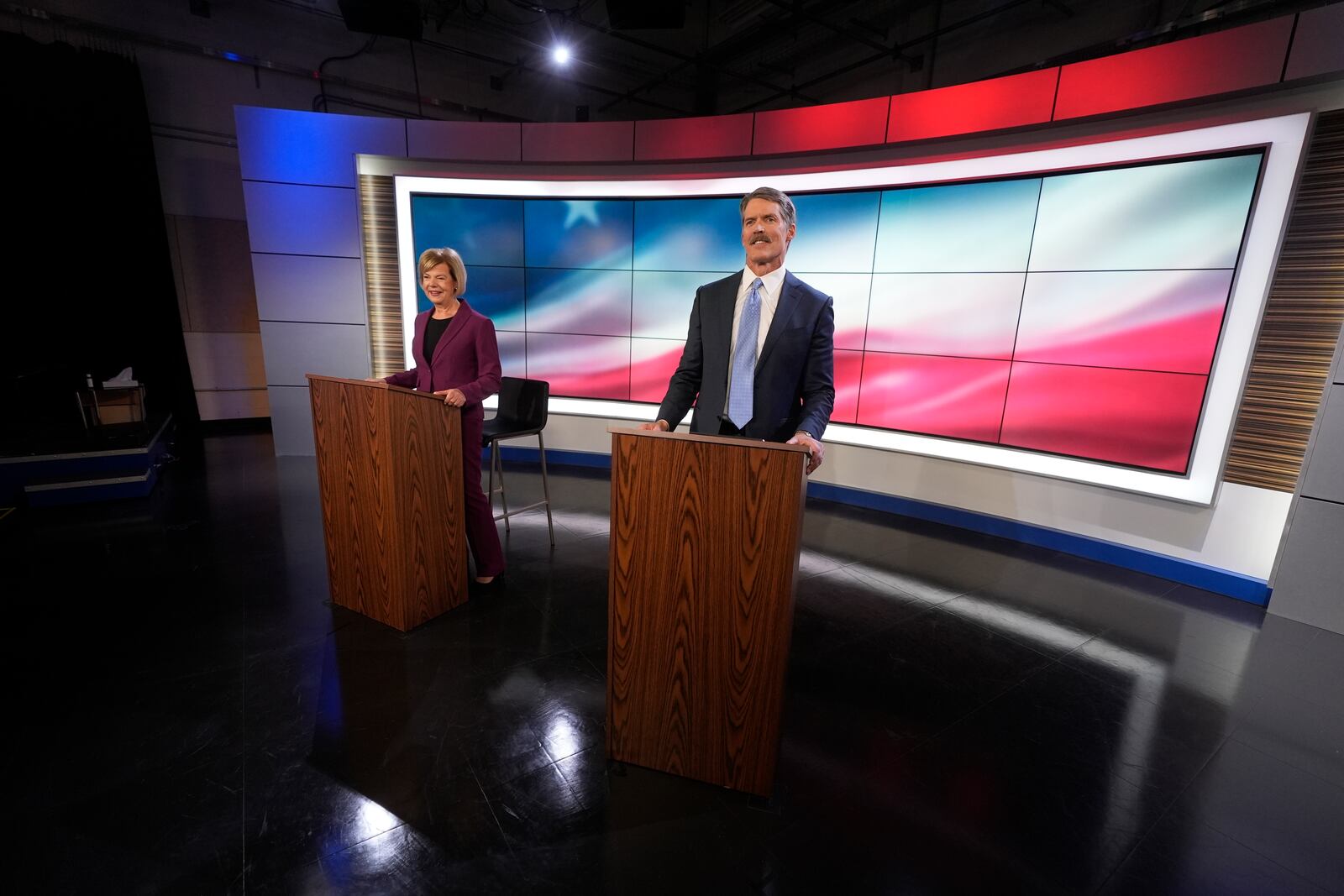 Wisconsin Senate candidates Republican Eric Hovde and Democratic U.S. Sen. Tammy Baldwin are seen before a televised debate Friday, Oct. 18, 2024, in Madison, Wis. (AP Photo/Morry Gash)