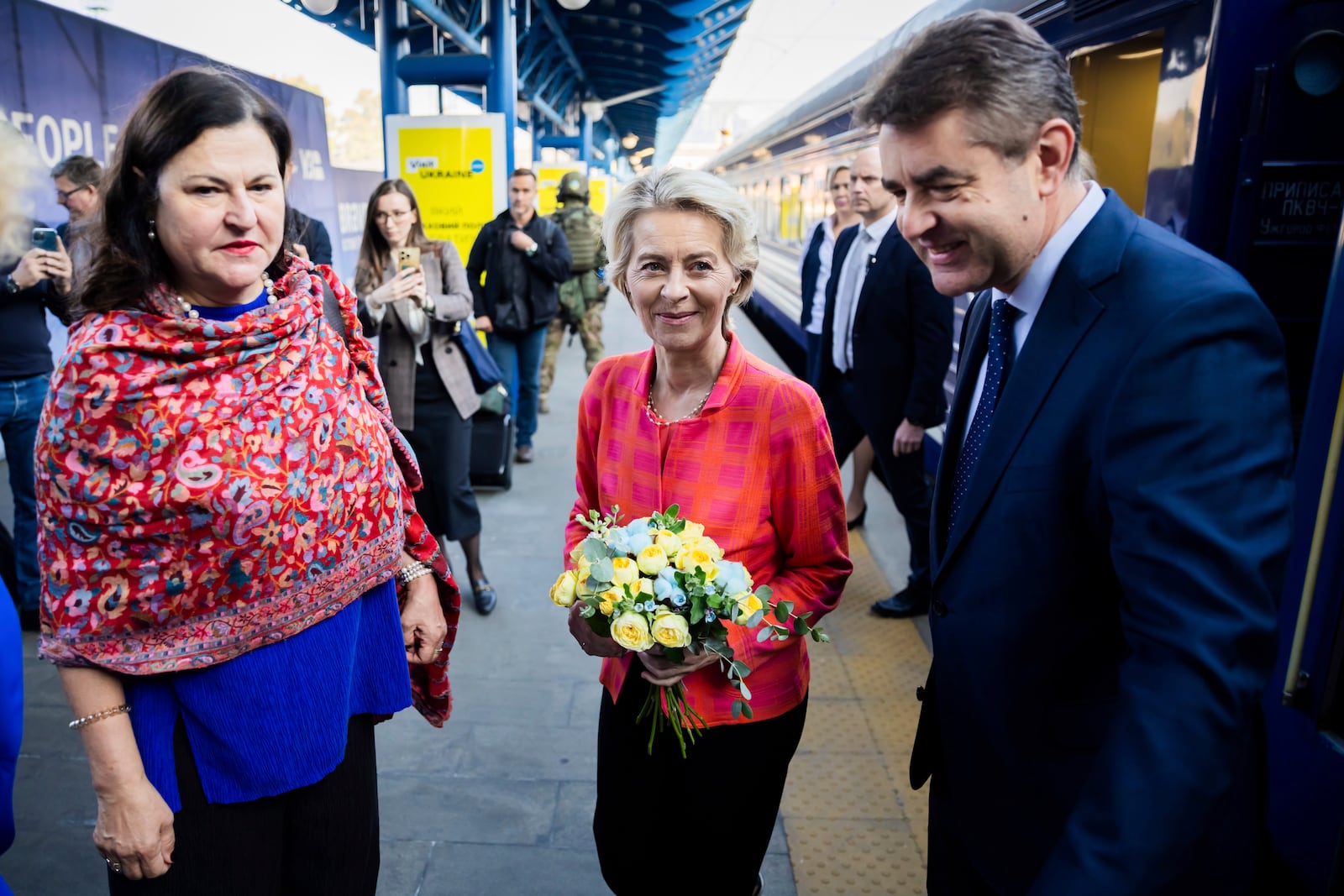 President of the European Commission, Ursula von der Leyen, center, is greeted as she arrives at the railway station in Kyiv, Ukraine, Friday, Sept. 20, 2024. (Christoph Soeder, Pool via AP)