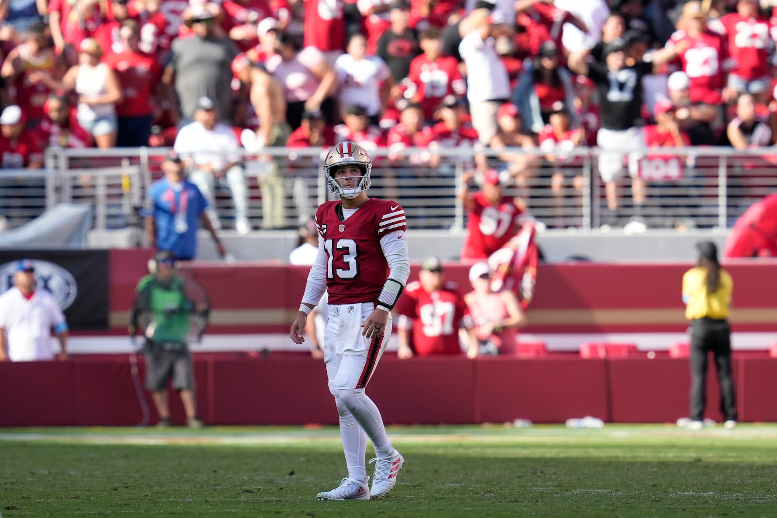 San Francisco 49ers quarterback Brock Purdy (13) walks toward the sideline during the second half of an NFL football game against the Arizona Cardinals in Santa Clara, Calif., Sunday, Oct. 6, 2024. (AP Photo/Godofredo A. Vásquez)