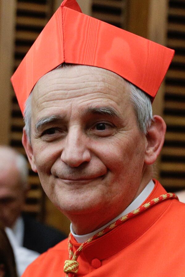 FILE - Cardinal Matteo Zuppi poses for photographers at the Vatican on Oct. 5, 2019. (AP Photo/Andrew Medichini, File)