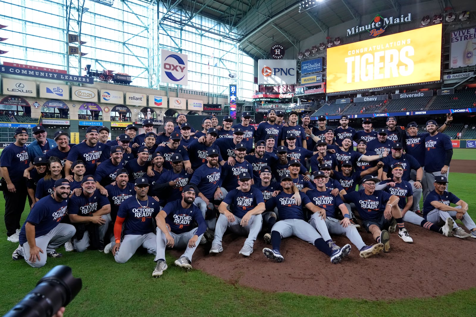 The Detroit Tigers pose for a team photo after their 5-2 win against the Houston Astros in Game 2 of an AL Wild Card Series baseball game Wednesday, Oct. 2, 2024, in Houston. (AP Photo/Kevin M. Cox)