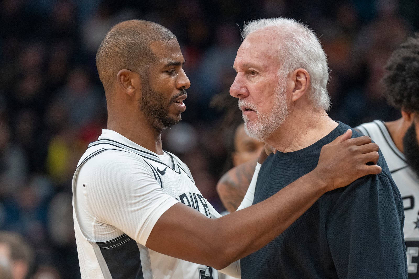 San Antonio Spurs guard Chris Paul has a word with Spurs head coach Gregg Popovich, during the second half of an NBA basketball game against the Utah Jazz, Thursday, Oct. 31, 2024, in Salt Lake City. (AP Photo/Rick Egan)