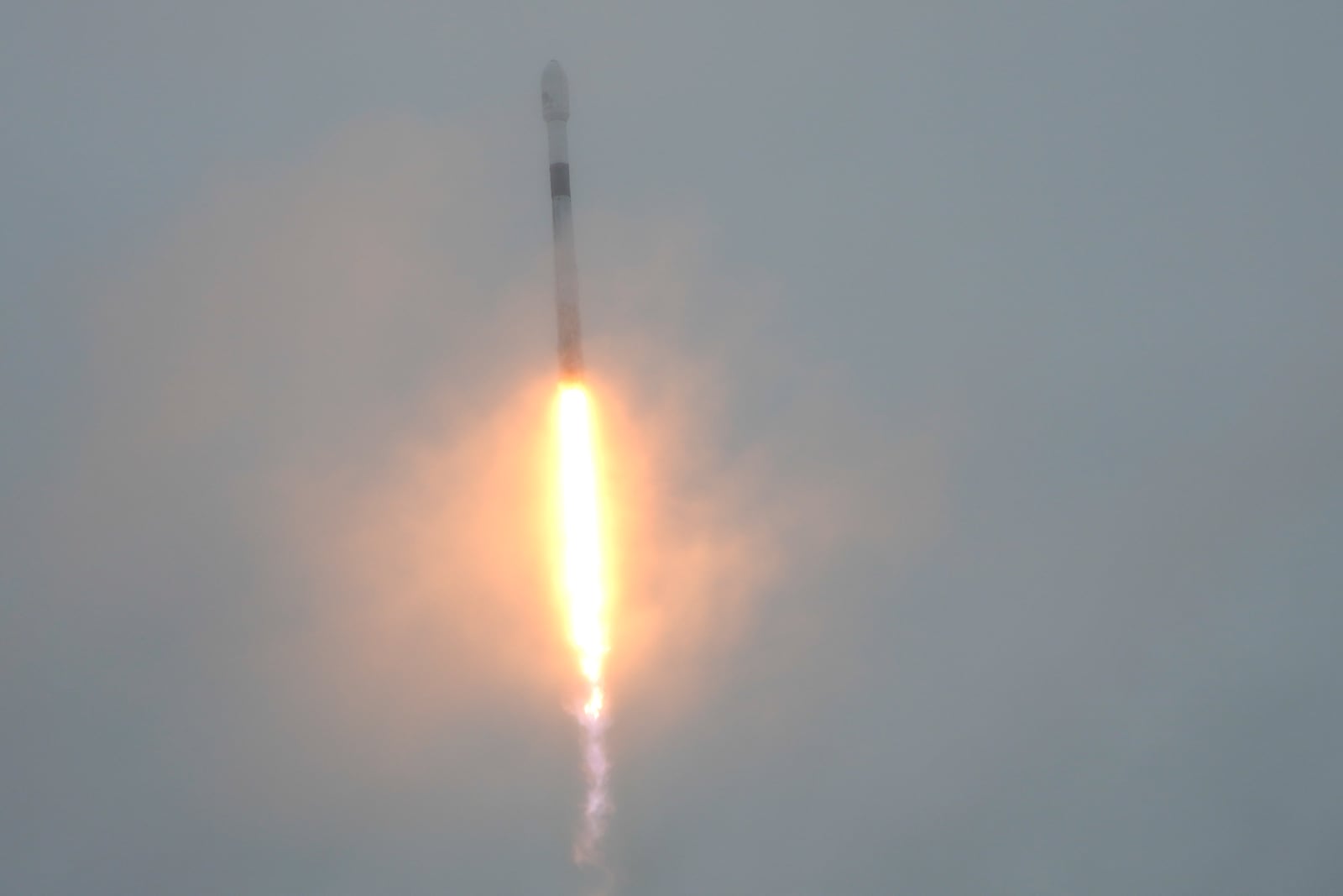 A SpaceX Falcon 9 rocket goes into clouds as it lifts off from the Cape Canaveral Space Force Station, Monday, Oct. 7, 2024 at Cape Canaveral, Fla., carrying a European spacecraft to an asteroid. (AP Photo/John Raoux)