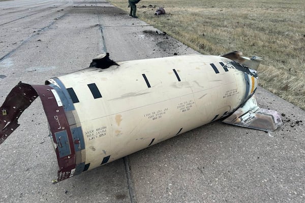 This photo released by Russian Defense Ministry official Telegram channel on Tuesday, Nov. 26, 2024, shows the fragments of a missile fired by Ukraine at the territory of Kursk airport in Russia. (Russian Defense Ministry Official Telegram Channel via AP)