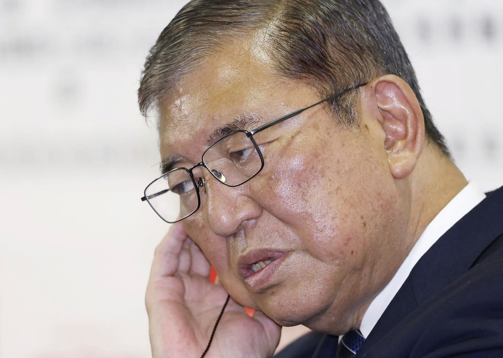 Japan's Prime Minister and president of the Liberal Democratic Party (LDP) Shigeru Ishiba speaks to the media regarding the lower house election, at the LDP headquarters Sunday, Oct. 27, 2024, in Tokyo, (Kyodo News via AP)