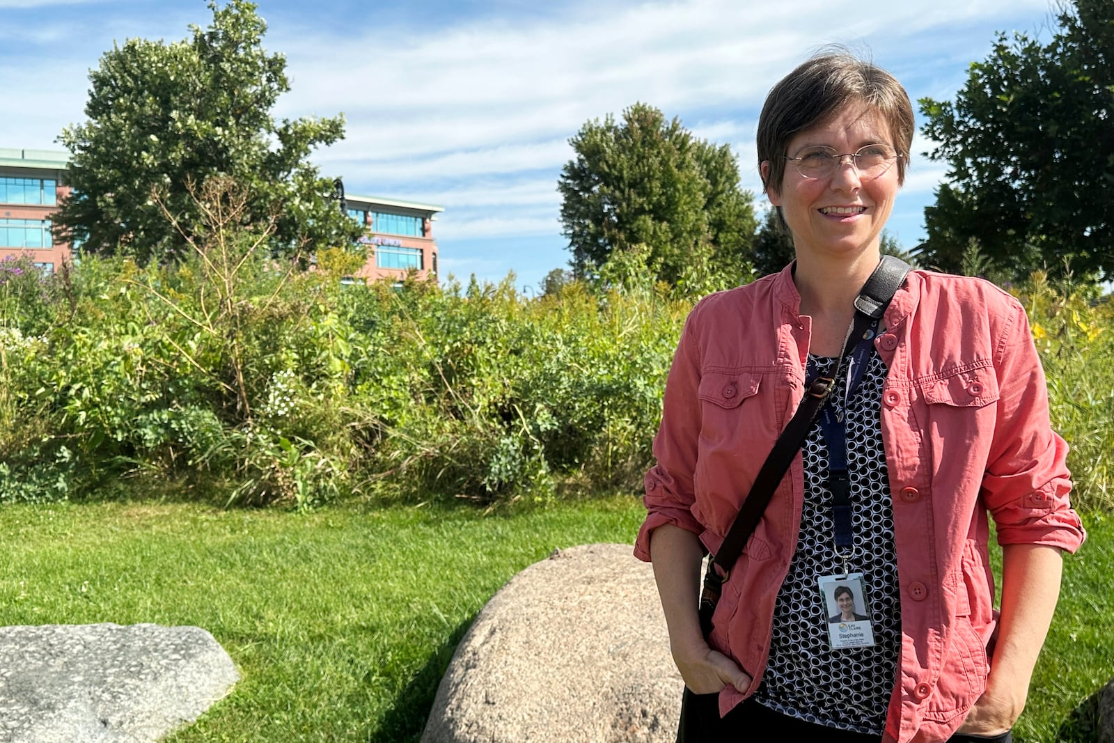 Stephanie Hirsch, city manager for Eau Claire, Wis., who supported the resettlement of refugees in the western Wisconsin city despite opposition from Republicans, poses in a downtown park ahead of a campaign visit from vice presidential candidate JD Vance Tuesday, Sept. 17, 2024. (AP Photo/Scott Bauer)