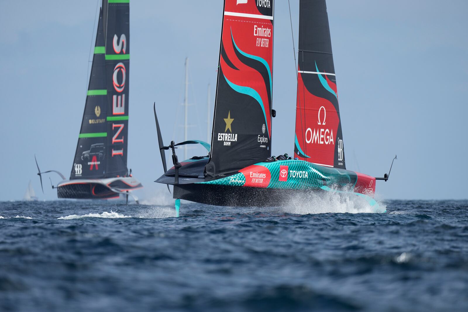 Ineos Britannia and Emirates Team New Zealand race during the Louis Vuitton 37th America's Cup Day 2 race in Barcelona, Spain, Sunday, Oct. 13, 2024. (AP Photo/Bernat Armangue)