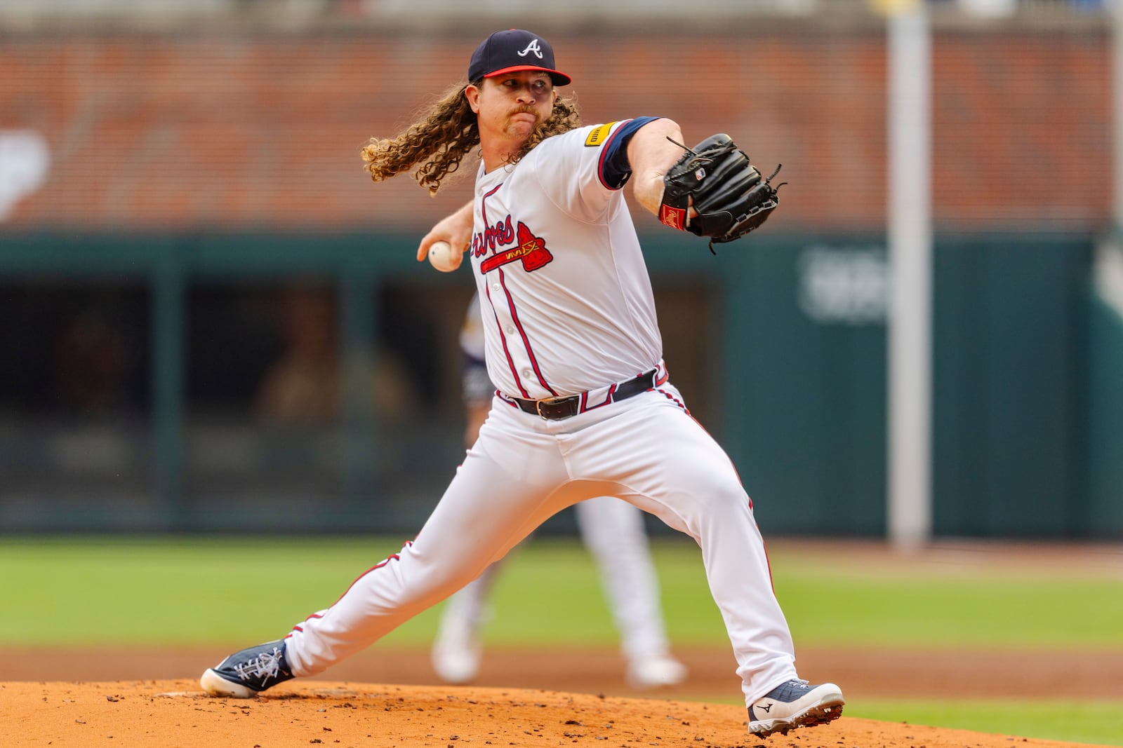 Atlanta Braves pitcher Grant Holmes throws in the second inning of the second baseball game of a doubleheader against the New York Mets, Monday, Sept. 30, 2024, in Atlanta. (AP Photo/Jason Allen)