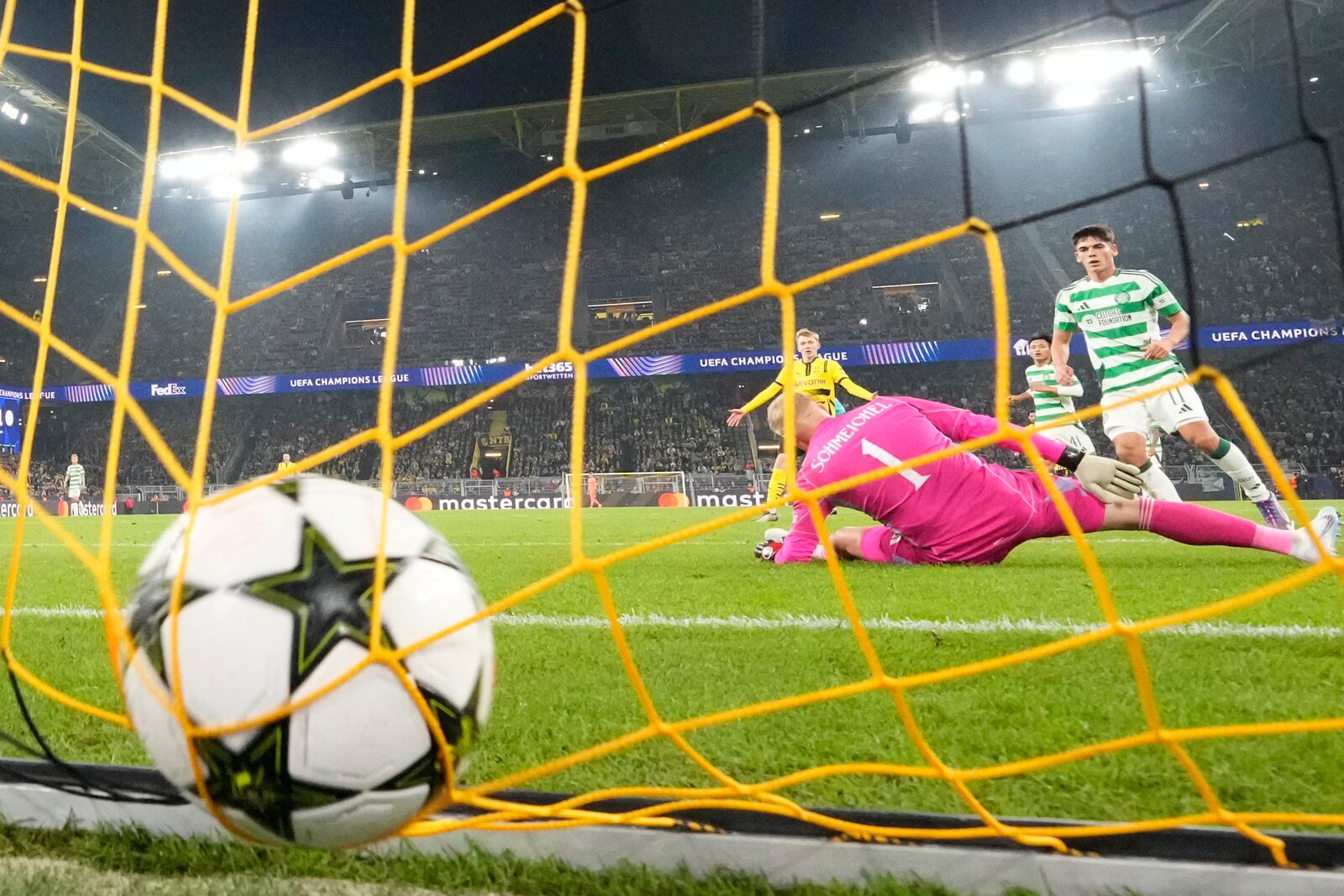 Celtic's goalkeeper Kasper Schmeichel receives the 6th goal by Dortmund's Serhou Guirassy during the Champions League opening phase soccer match between Borussia Dortmund and Celtic FC at the BVB Stadion in Dortmund, Tuesday, Oct. 1, 2024. (AP Photo/Martin Meissner)