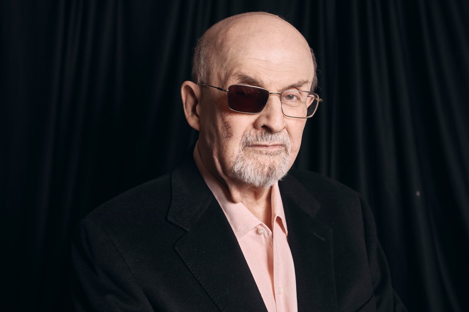 FILE - Salman Rushdie poses for a portrait to promote his book "Knife: Meditations After an Attempted Murder" on April 18, 2024, in New York. (AP Photo/Andres Kudacki, File)