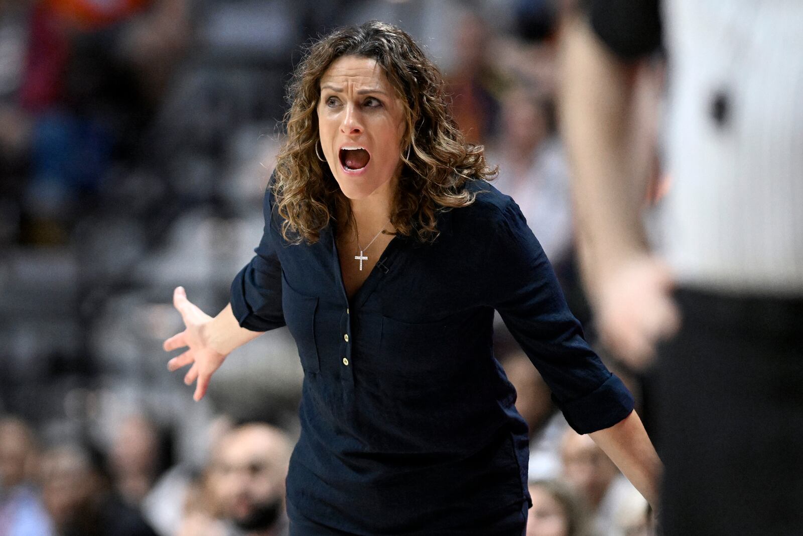 Connecticut Sun head coach Stephanie White reacts during the first half of a WNBA basketball semifinal game against the Minnesota Lynx, Friday, Oct. 4, 2024, in Uncasville, Conn. (AP Photo/Jessica Hill)