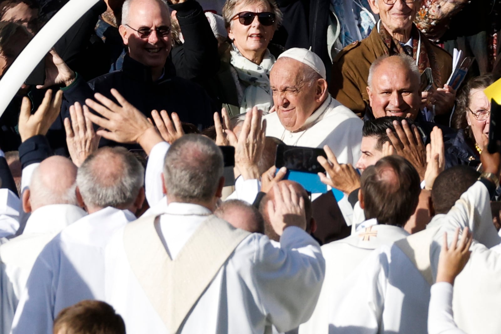 Pope Francis arrives to lead the holy mass , at the King Baudouin stadium in Brussels, Belgium, Sunday, Sept. 29, 2024. (AP Photo/Omar Havana)