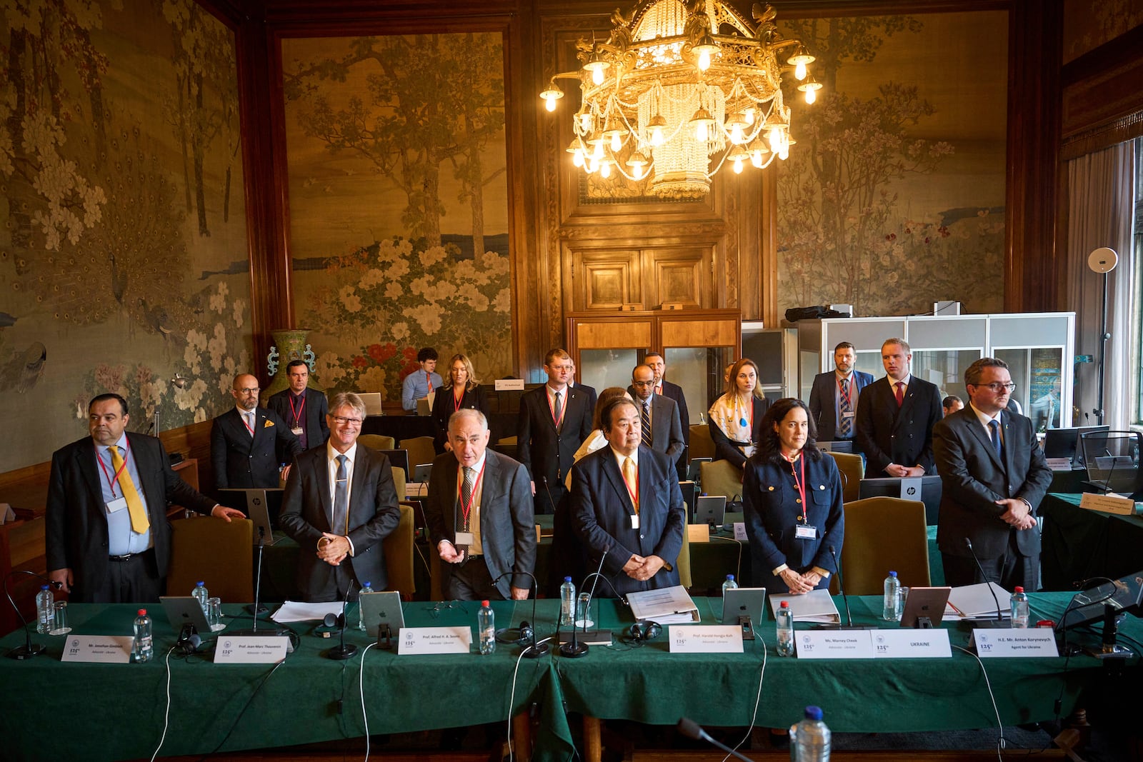 The Ukrainian delegation at the start of PCA Case between Ukraine and the Russian Federation in the Netherlands, Monday, Sept. 23, 2024. (AP Photo/Phil Nijhuis)