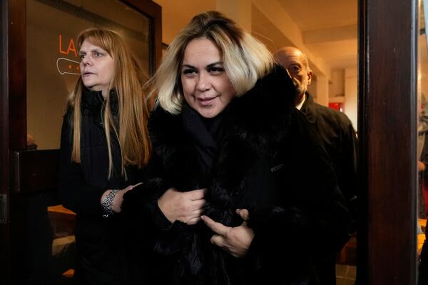 Veronica Ojeda, former partner of the late soccer star Diego Maradona, leaves a cafe during a break in the trial of health professionals accused of negligence in his death, in San Isidro, on the outskirts of Buenos Aires, Argentina, Tuesday, May 27, 2025. (AP Photo/Gustavo Garello)