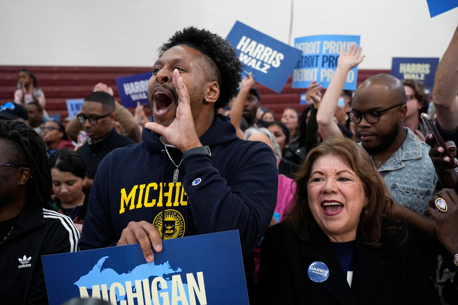 Supporters watch as Democratic presidential nominee Vice President Kamala Harris speaks during a campaign event at Western International High School in Detroit, Saturday, Oct. 19, 2024. (AP Photo/Jacquelyn Martin)