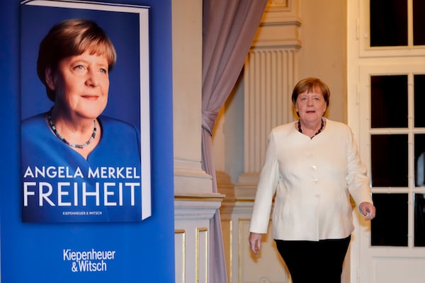 Former German Chancellor Angela Merkel arrives for the presentation of her memories in Berlin, Germany, Tuesday, Nov. 26, 2024. Book title reads "Freedom". (AP Photo/Markus Schreiber)